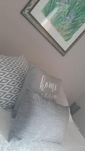 a home made pillow with the words home made me at Sunshine's casa vacanze in Ortona