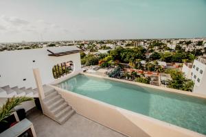 La alberca dentro o cerca de Itzamna luxury condos whit ocean viewpool