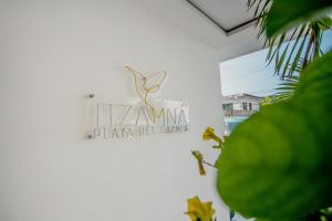 Un certificado, premio, letrero u otro documento en Itzamna luxury condos whit ocean viewpool