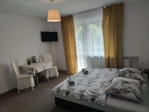 Postel nebo postele na pokoji v ubytování Willa LiMoni