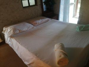 Hostal La Cabaña客房内的一张或多张床位