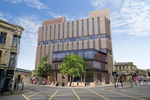 a rendering of a building on a city street at High Point 2 bed Apartment in Bradford