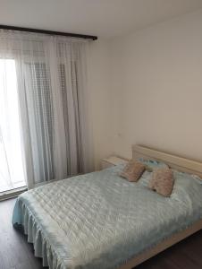 Posteľ alebo postele v izbe v ubytovaní Híd Köz Penthouses Apartman