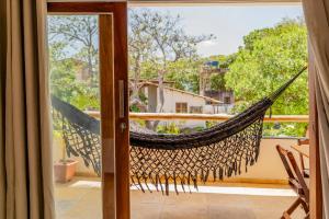 Uma varanda ou terraço em Casa Suiça Brasileira