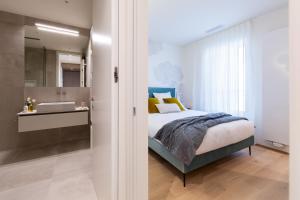 Voodi või voodid majutusasutuse The Central City - Luxury Serviced Residence toas