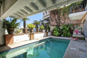 Swimmingpoolen hos eller tæt på Residencias del Encanto