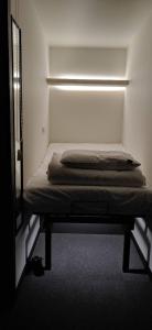 Postel nebo postele na pokoji v ubytování KOZAYO Hongdae Hostel