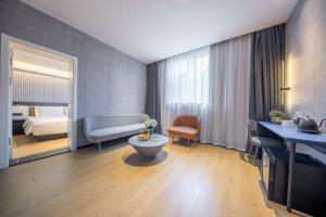 Ένα ή περισσότερα κρεβάτια σε δωμάτιο στο Atour Light Hotel Beijing Zhongguancun Renmin University