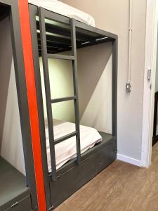 Hostel Distrito 011客房内的一张或多张床位