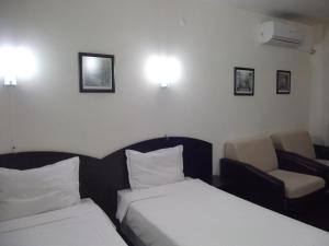 Postel nebo postele na pokoji v ubytování Hotel Enchevi