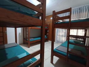 Postel nebo postele na pokoji v ubytování Wijaya Hostel