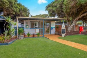 a house with a green lawn in front of it at Tasman Holiday Parks - Yallingup Beach in Yallingup +43 photos
