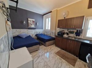 Kuchyň nebo kuchyňský kout v ubytování AURY HOME -Corso XX Settembre
