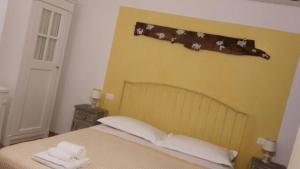 Postel nebo postele na pokoji v ubytování Residenza CuordiVerona
