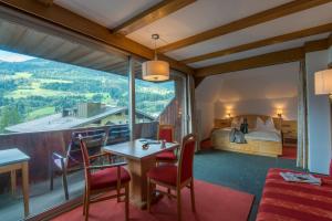 Postel nebo postele na pokoji v ubytování Haus Friedrichsburg - Bergbahnen von Mai bis November inklusive