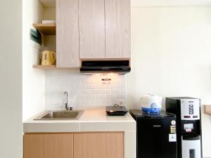 Kuchyň nebo kuchyňský kout v ubytování Simply Look Studio at Pollux Chadstone Apartment By Travelio