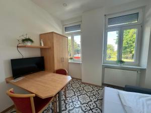 Sjónvarps- og/eða afþreyingartæki á Gästehaus LINH