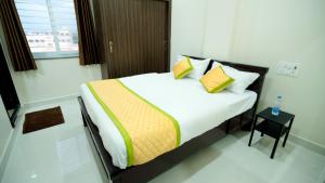 Voodi või voodid majutusasutuse Divya Comforts- 2BHK toas