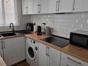 Kuchnia lub aneks kuchenny w obiekcie Apartment Amelia