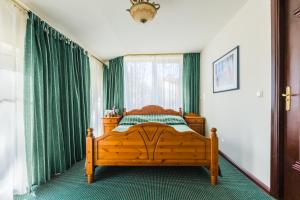 Postel nebo postele na pokoji v ubytování Daina Jurmala Beach Hotel
