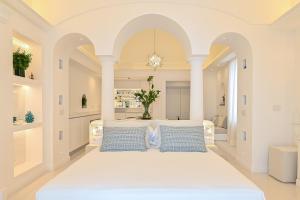 Ένα ή περισσότερα κρεβάτια σε δωμάτιο στο Residenza La Zerina