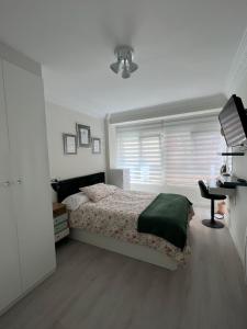 Tempat tidur dalam kamar di Aile