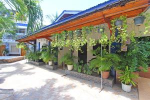 Zahrada ubytování Foxtail Siargao Island Guesthouse