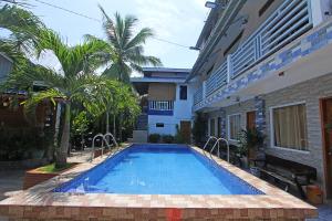 Bazén v ubytování Foxtail Siargao Island Guesthouse nebo v jeho okolí