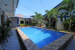 Bazén v ubytování Foxtail Siargao Island Guesthouse nebo v jeho okolí