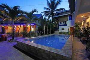 Bazén v ubytování Foxtail Siargao Island Guesthouse nebo v jeho okolí