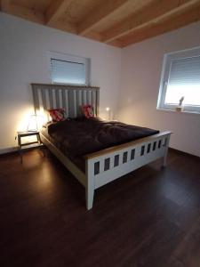 Ένα ή περισσότερα κρεβάτια σε δωμάτιο στο Lodge für Gesundheitsbewusste