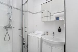 Koupelna v ubytování Enjoy Downtown Boutique Apartments #12 by Goodnite cz