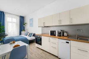 Kuchyň nebo kuchyňský kout v ubytování Enjoy Downtown Boutique Apartments #12 by Goodnite cz