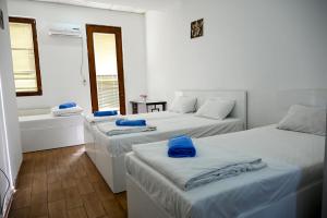 Postel nebo postele na pokoji v ubytování Star Hotel
