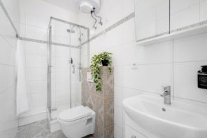 Koupelna v ubytování Enjoy Downtown Boutique Apartments #12 by Goodnite cz