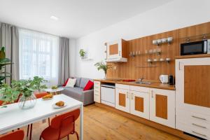 Kuchyň nebo kuchyňský kout v ubytování Enjoy Downtown Boutique Apartments #12 by Goodnite cz
