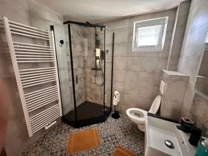 Kúpeľňa v ubytovaní Apartmány Hanička