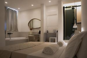Posteľ alebo postele v izbe v ubytovaní San Michele Luxury Rooms