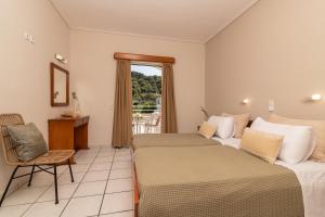 Postel nebo postele na pokoji v ubytování Daisy Hotel