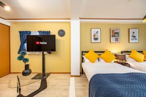 En eller flere senge i et værelse på アリタマンション日本橋