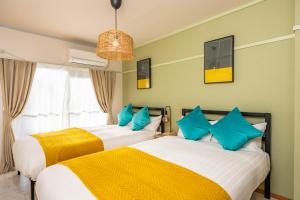 En eller flere senge i et værelse på アリタマンション日本橋 + 224 billeder