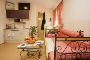 Kuchyň nebo kuchyňský kout v ubytování Mediterran Hotel Juwel