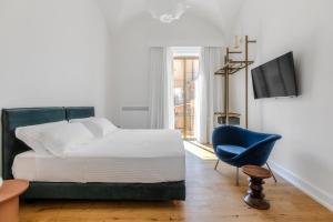 Letto o letti in una camera di Dome Hotel
