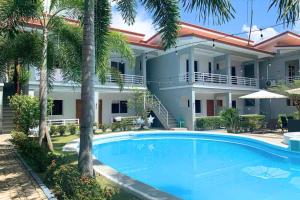 Bazén v ubytování Azahar Resort Panglao powered by Cocotel nebo v jeho okolí
