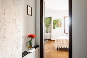 A bed or beds in a room at Bed & Breakfast L'erica