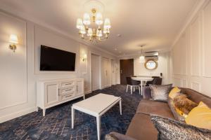 TV a/nebo společenská místnost v ubytování Gradiali Wellness and SPA