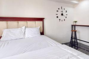 Postel nebo postele na pokoji v ubytování RedLiving Apartemen Mutiara - Star Rooms Tower A + 19 fotografií