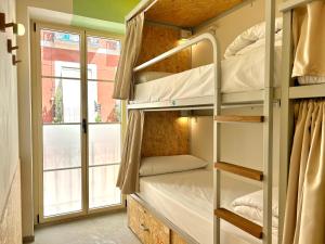 The Loft House Madrid客房内的一张或多张床位