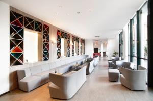 Zona de estar de Trans World Hotel Donauwelle