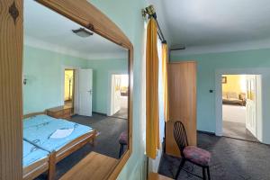 Postel nebo postele na pokoji v ubytování Hotel RON